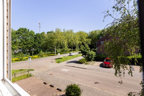 Foto - Te koop: Nette tussenwoning in het gezellige Klundert!